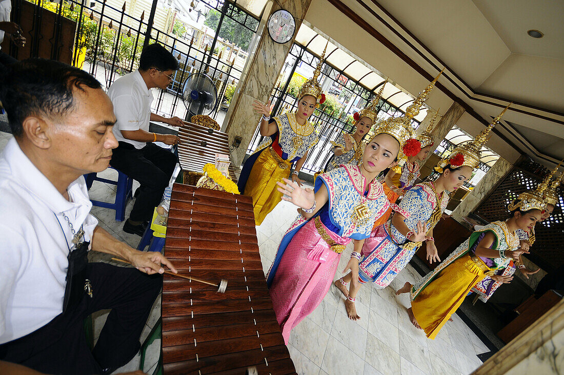 Dancers in the Erawan Shrine, Thai dance troupe, Bangkok, Thailand