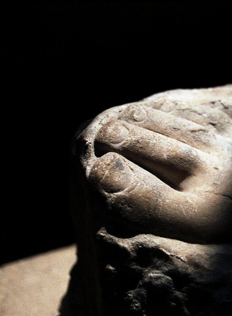 Detail of foot of statue at the Louvre, Paris, France