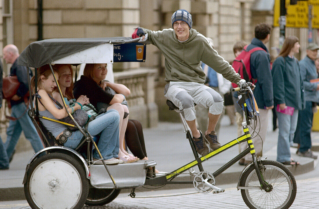 Tricycle taxi. Royal Mile. Edinburgh. License image 70200178 lookphotos