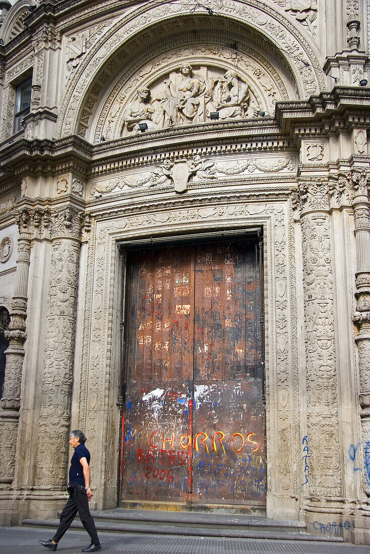 Grafittied door of a bank. Buenos Aires, Argentina