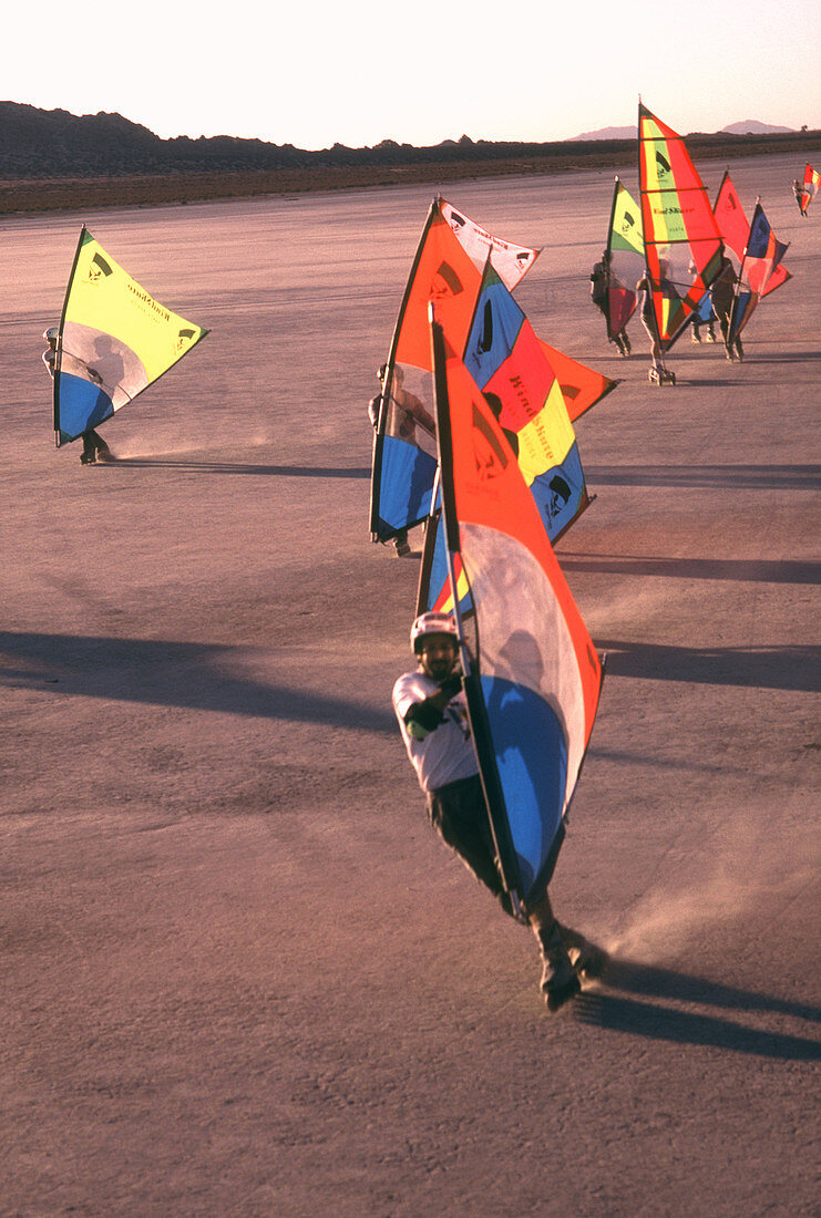 Leading windskate regatta across Mojave desert, dry lake bed. California. USA.
