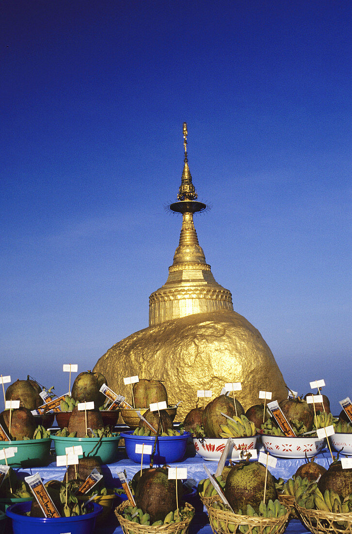 Offerings at the golden rock. Myanmar
