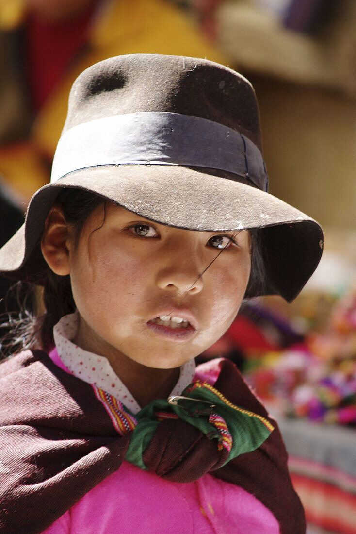 Indigenous girl in cape at Tarabuco market, Bolivia