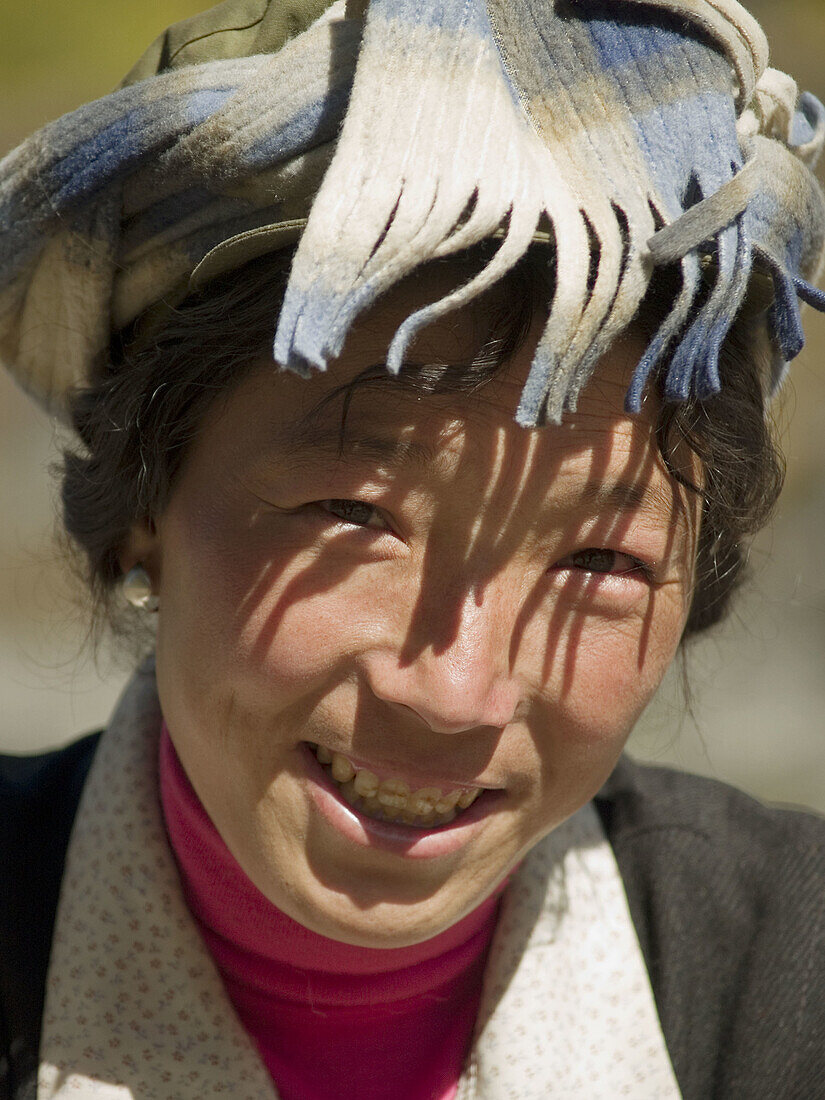 smiling Tibetan gal, Yading National Park, Szechuan, China