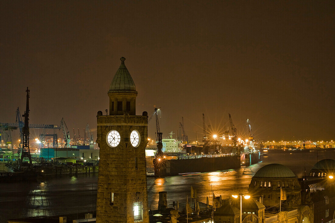 St. Pauli Landungsbrucken and harbor at night, Hamburg, Germany