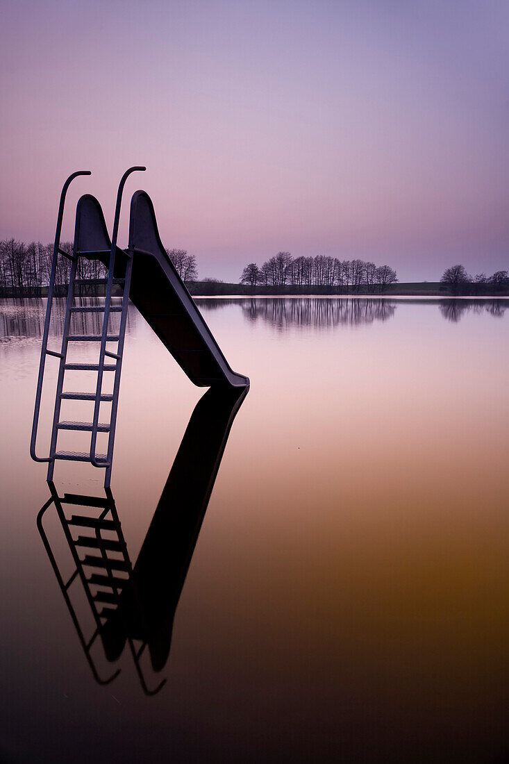 Slide in a swimming lake, Schleswig-Holstein, Germany