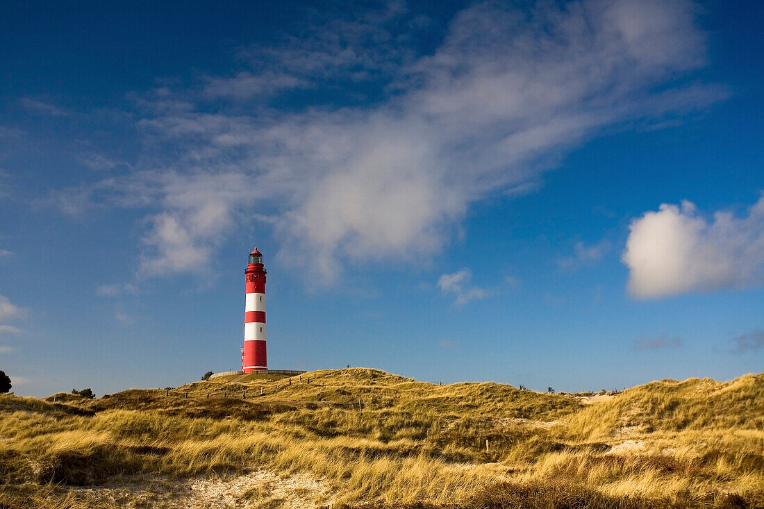View over Kniepsand dunes to lighthouse, Amrum island, Schleswig-Holstein, Germany