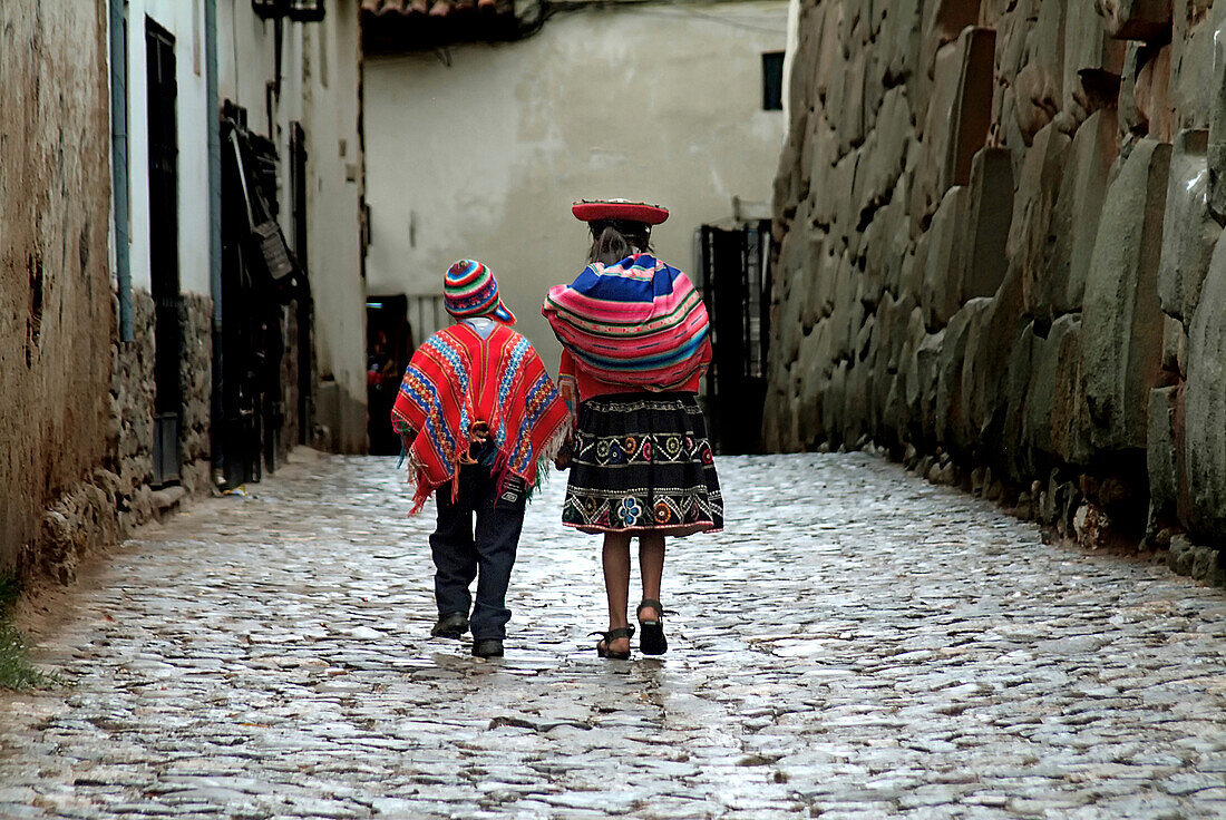 Inca children in an alley in Cusco, Peru, South America