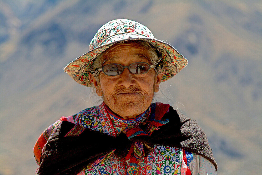 Old Inca woman at Colca Canyon, Peru, South America
