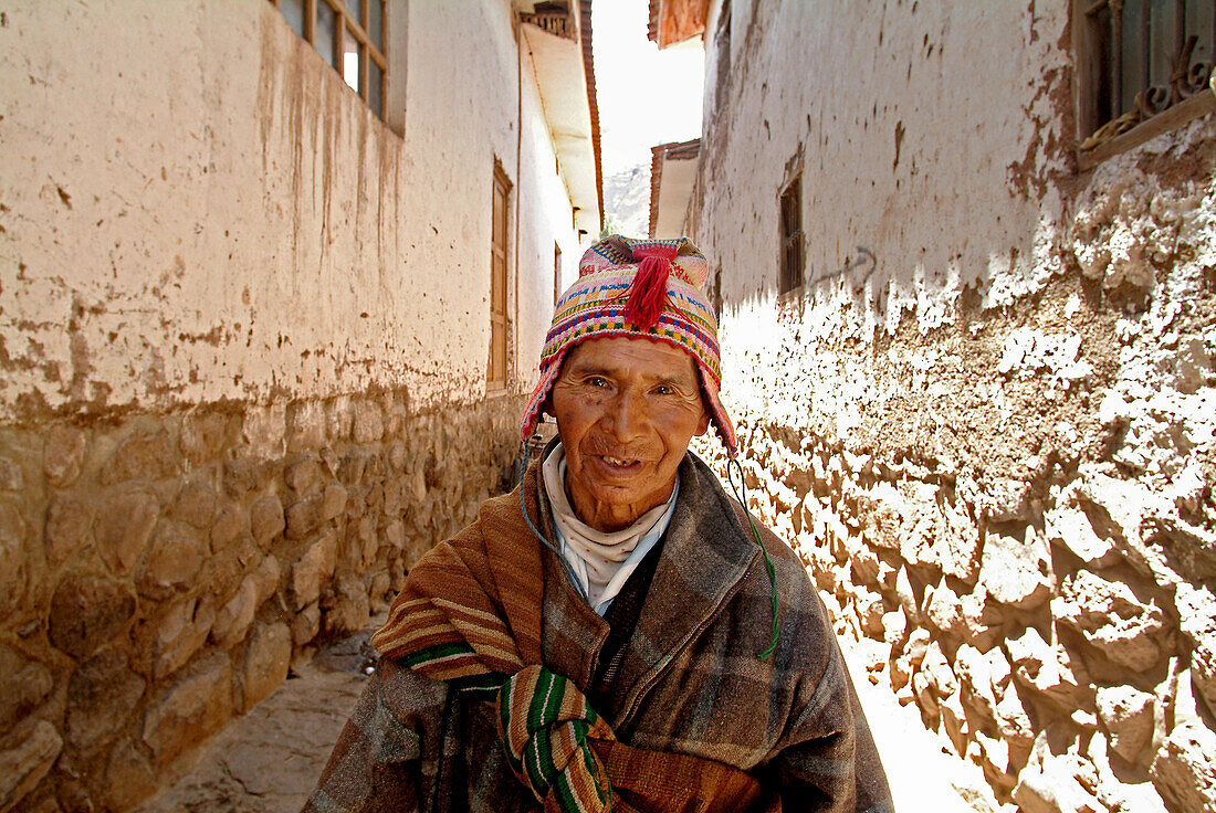 Inca peasant in an alley in Pisac, Peru, South America