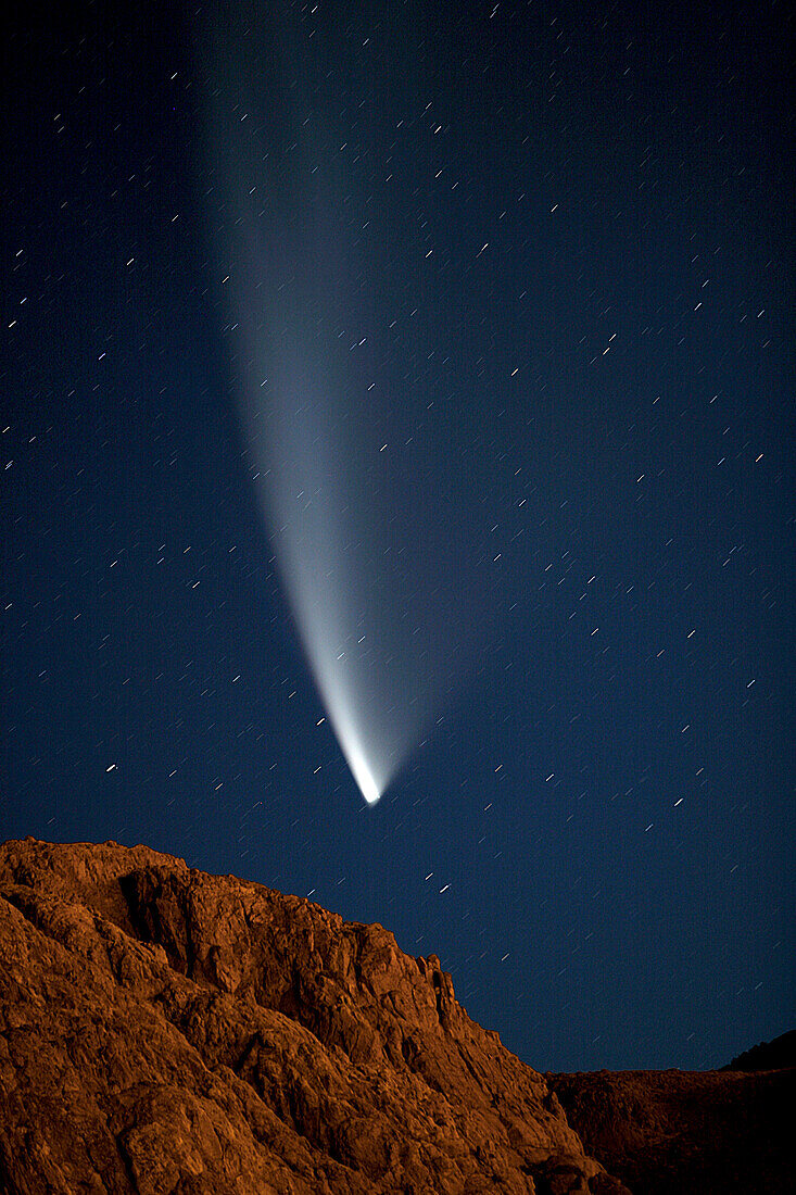 McNaught comet flying over the night sky, Patagonia, Argentina, South America