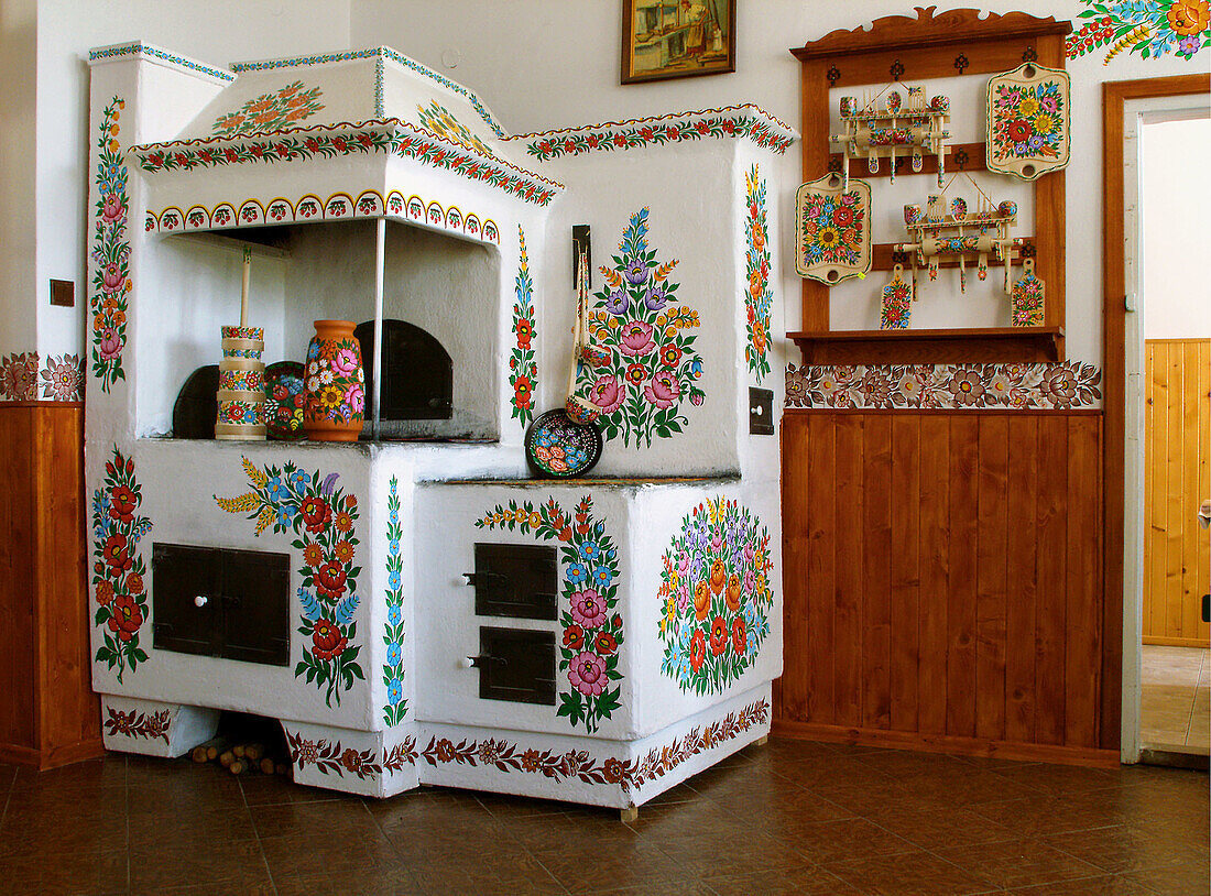 Hand painted flowers on oven in picturesque Zalipie of Poland