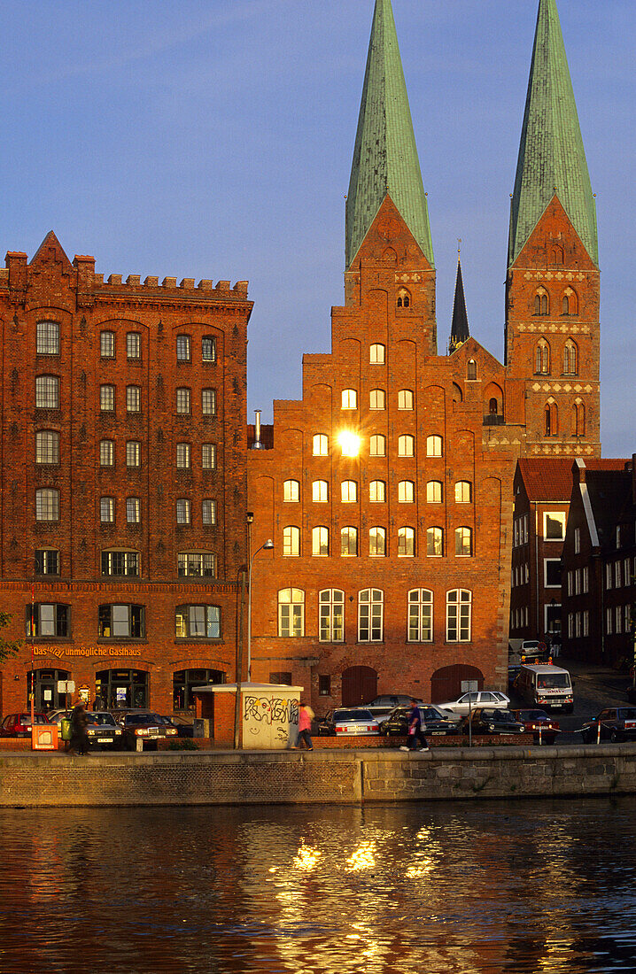 Gabled houses and St. Mary's Church in the light of the evening sun, Luebeck, Schleswig Holstein, Germany, Europe