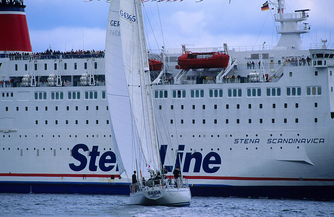 Sailing boat in front of a ferry, Kiel week, Kiel, Schleswig Holstein, Germany, Europe