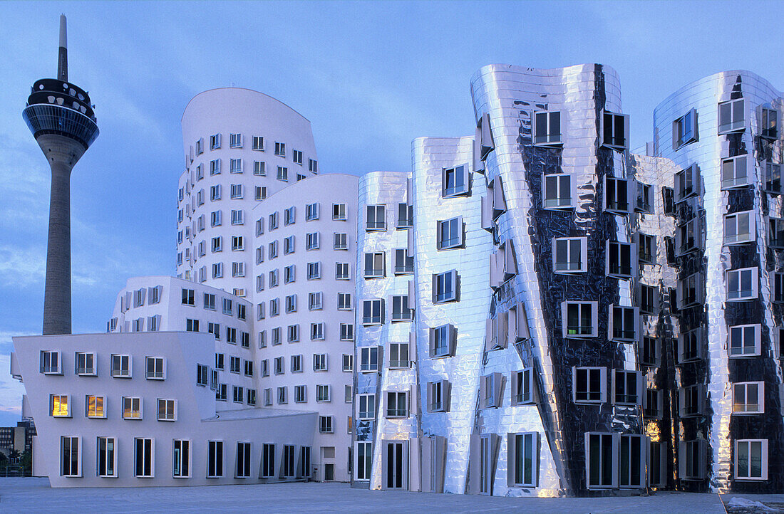 Gehry Buildings, Neuer Zollhof, Rheinturm im background, Media Harbor, Dusseldorf, North Rhine-Westphalia, Germany