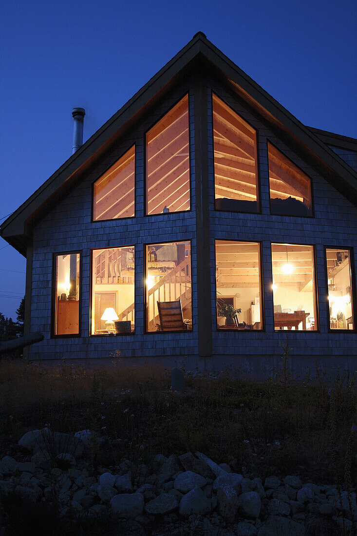 Nova Scotia Canada, illuminated wooden summerhouse at dawn