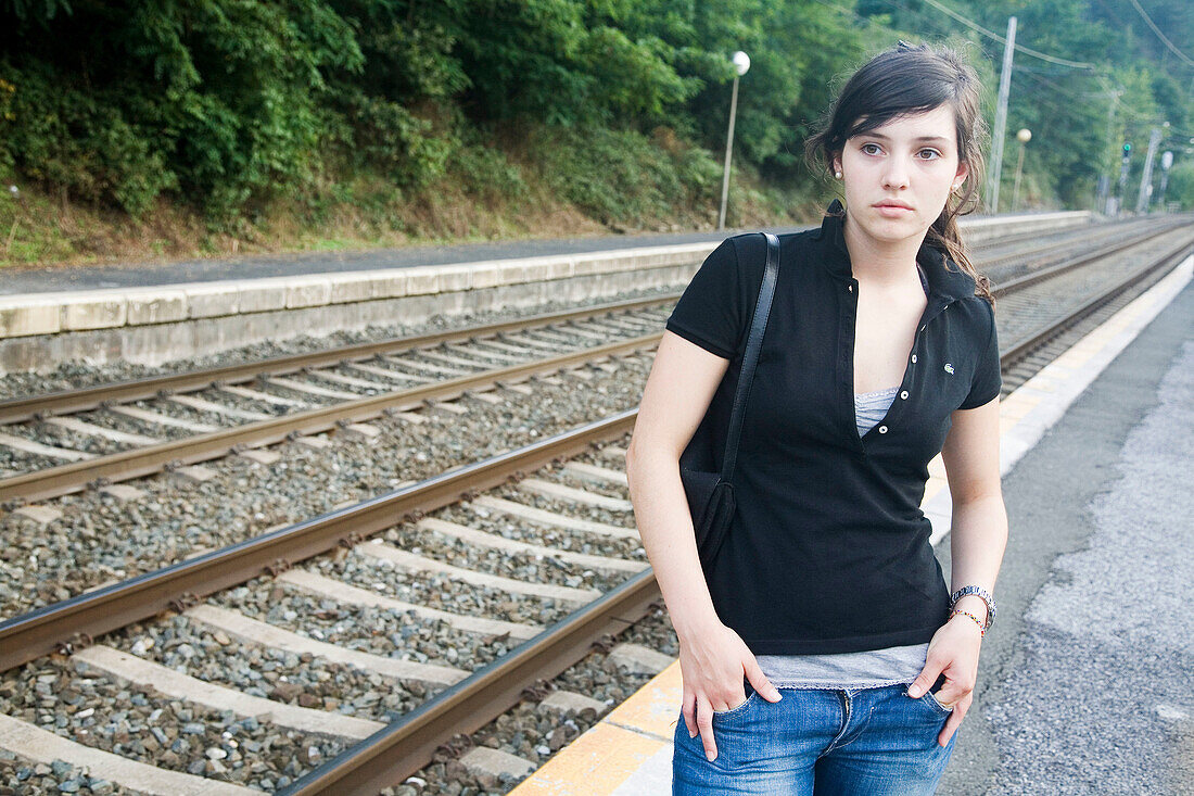 18 year old girl at train station. Legazpi, Guipuzcoa, Basque Country, Spain