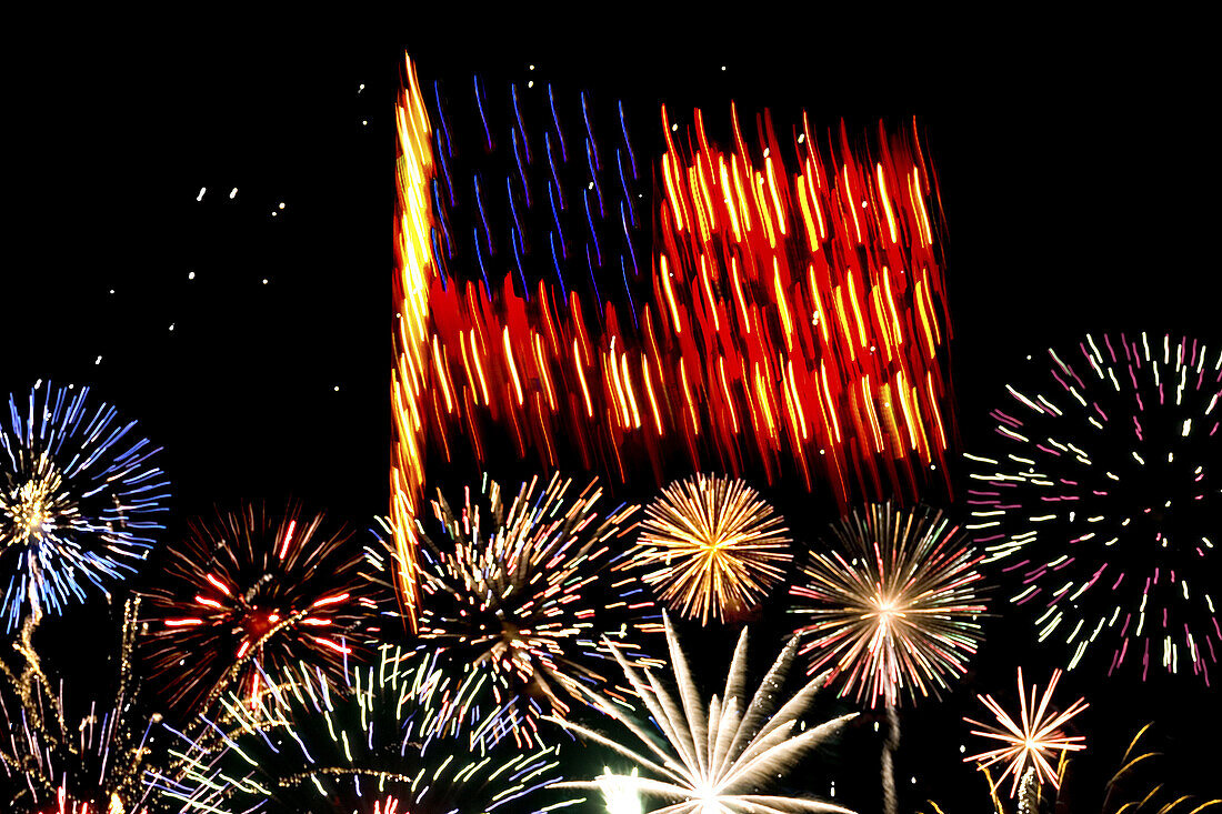 Firework display with United States flag