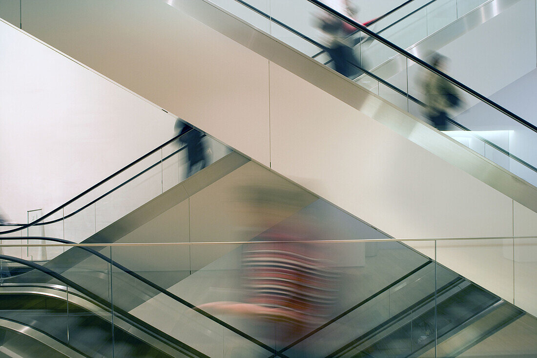 People on escalators, Museum of Modern Art, midtown Manhattan, NYC, USA