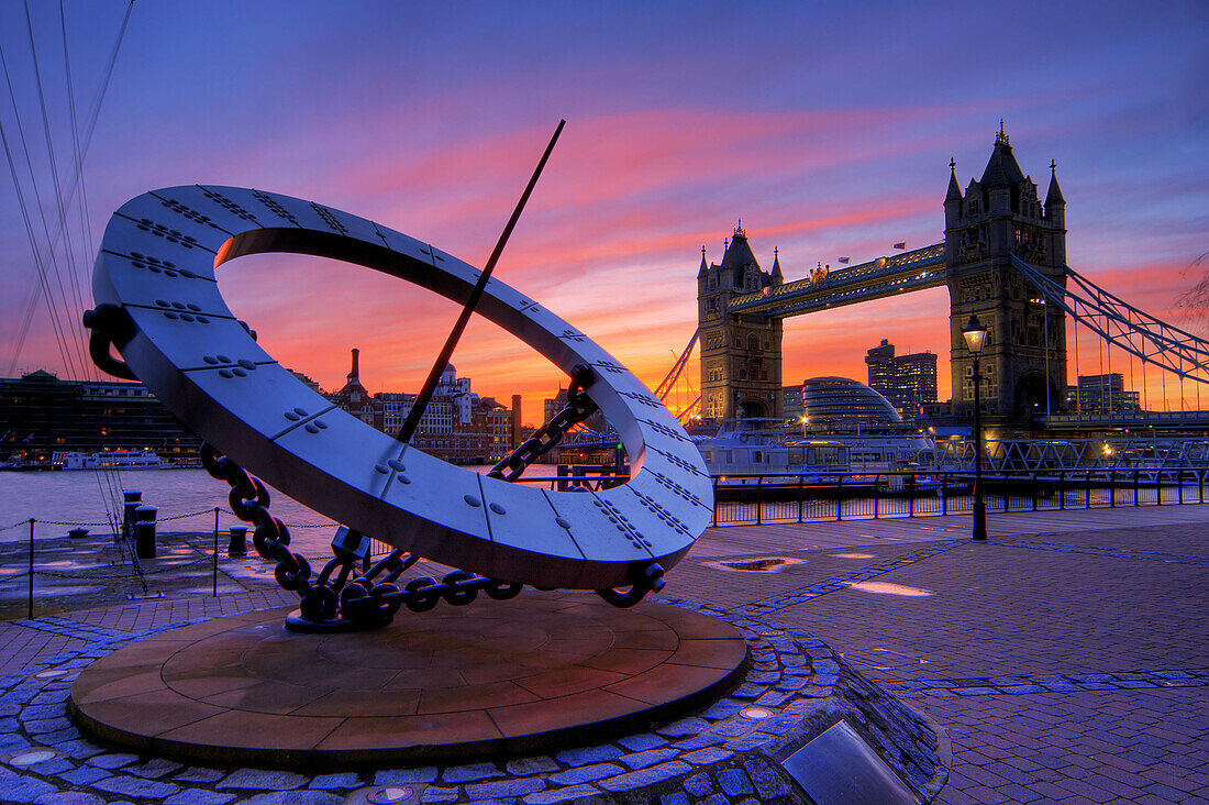 tower bridge and giant time sundial dusk sunset london england uk europe