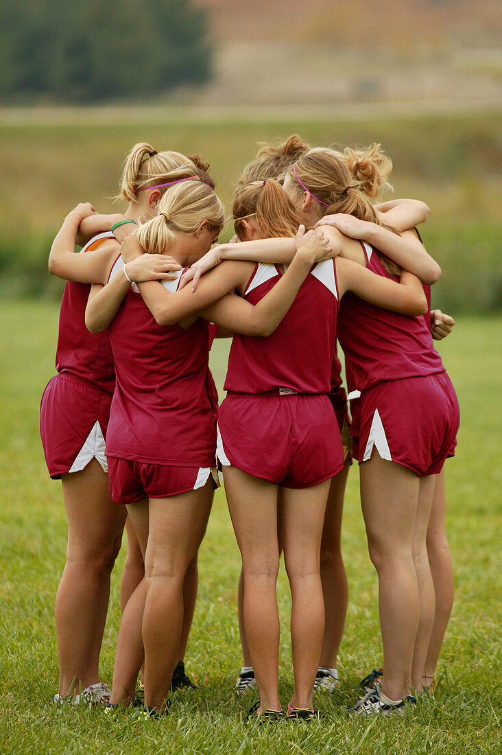 Teamwork, girls in huddle