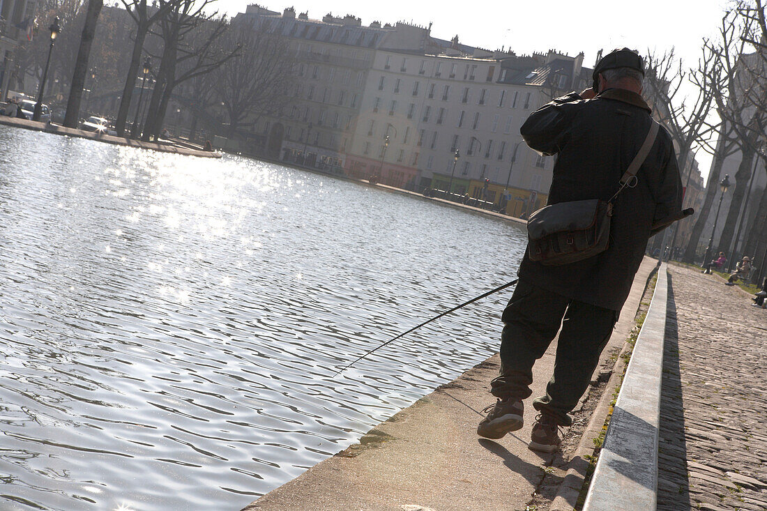 Fishing on the Canal St. Martin, Paris, France