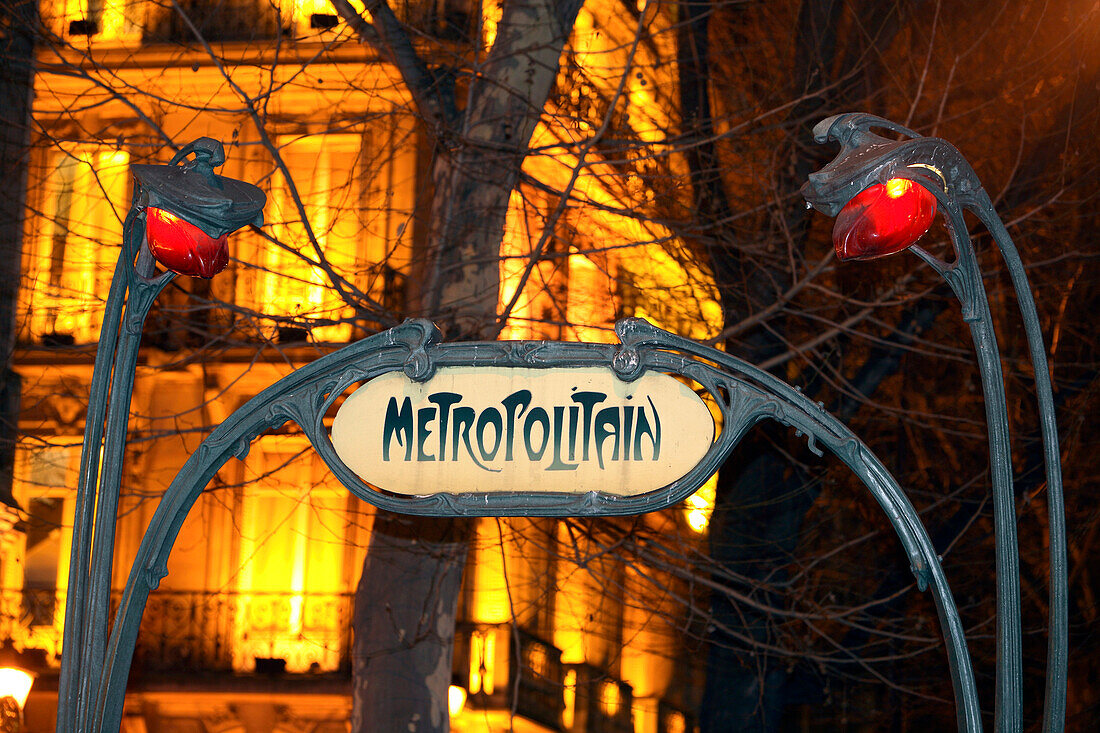 Metropolitan underground entrance by night, Place St Michel, Paris, France