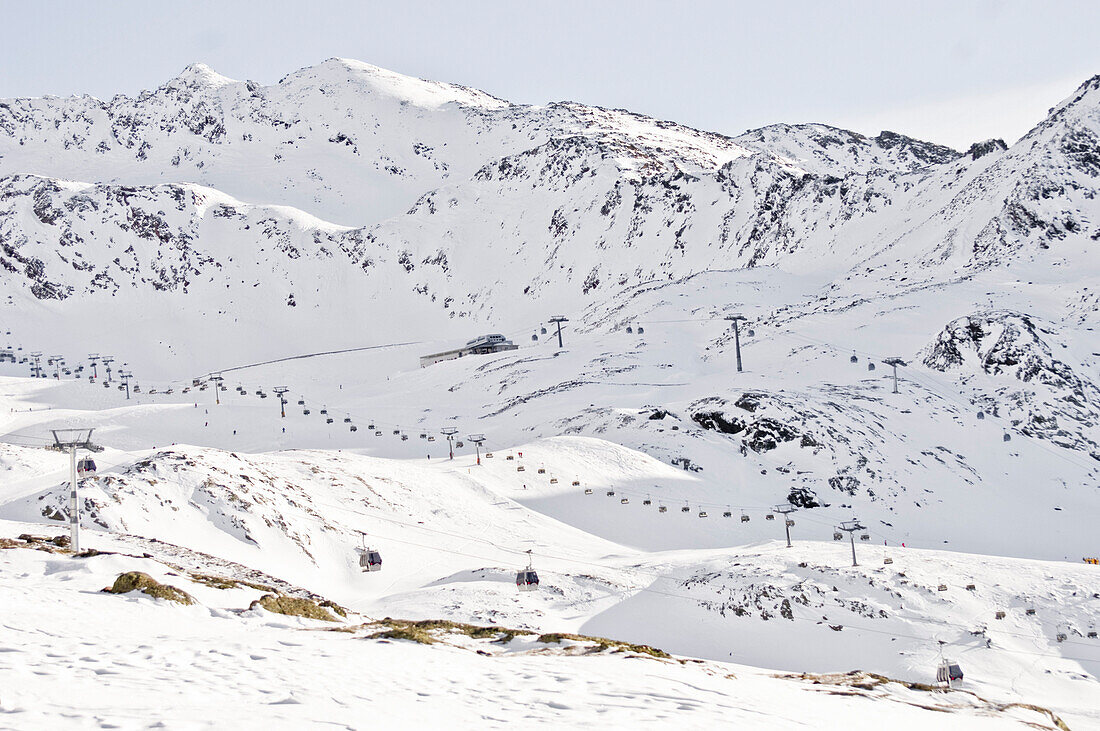 Idyllic snow-covered ski landscape with gondola and ski elevator, Ötztal, Obergurgel, Austria