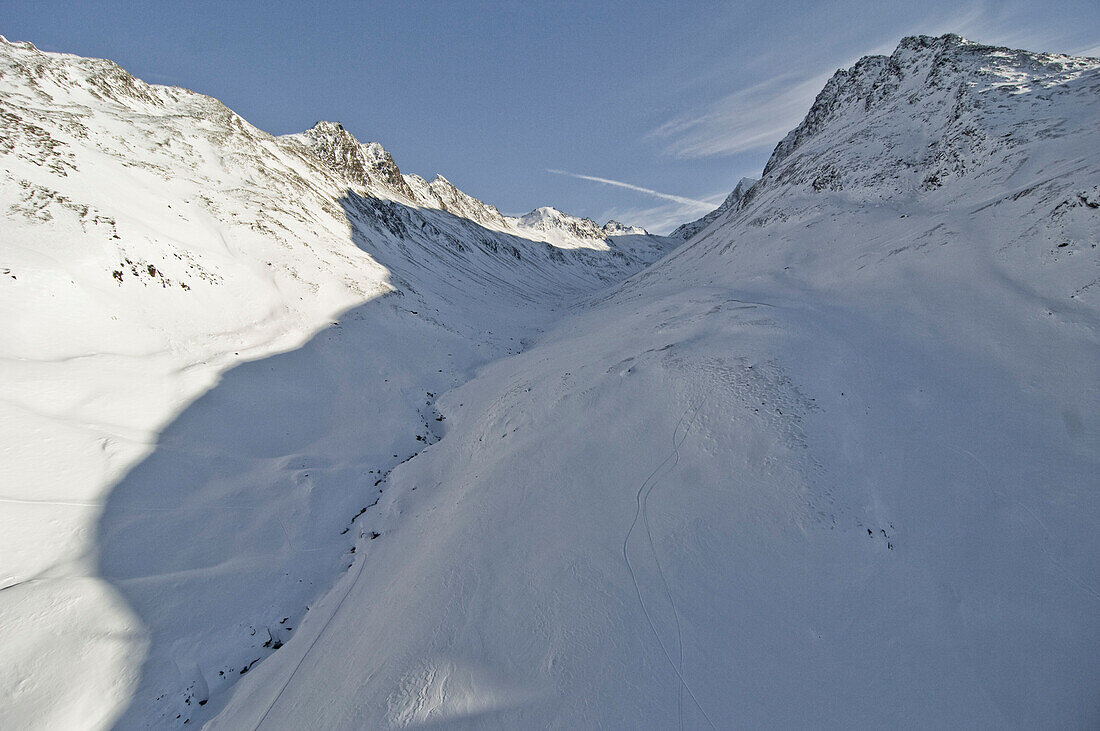 Glacier under blue sky in the half shadow, Ötztal, Obergurgel, Austria