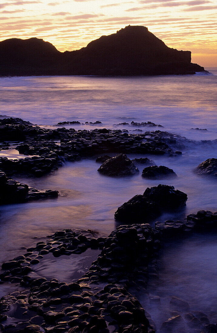 Giant's Causeway, Basalt Columns at the coastline in the evening, County Antrim, Ireland, Europe, The Giant’s Causeway, World Heritage Site, Northern Ireland