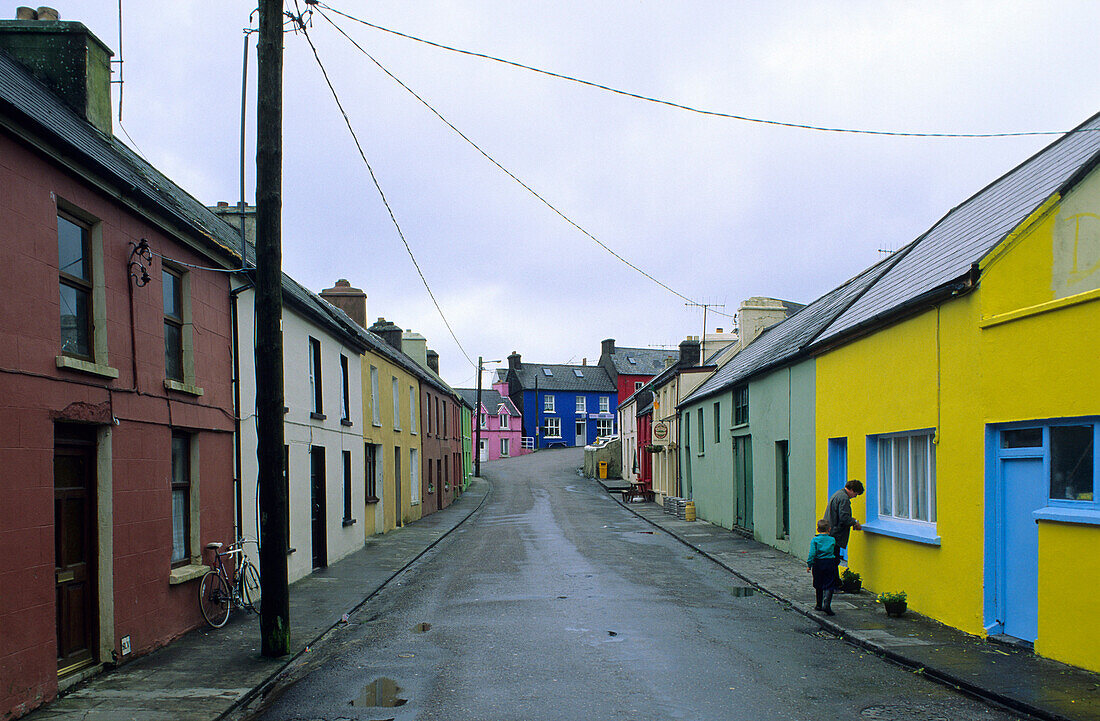 Colourful houses under clouded sky, Eyeries, Beara peninsula, County Cork, Ireland, Europe