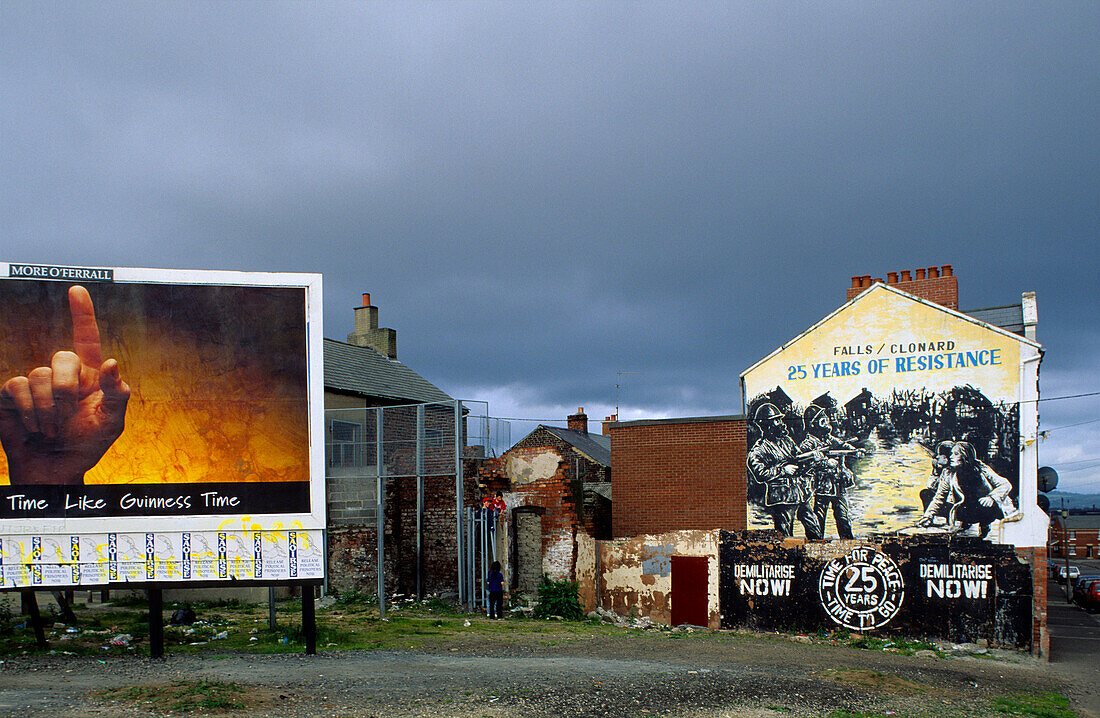 Painted wall of a house under grey clouds, Belfast, Antrim, Ireland, Europe