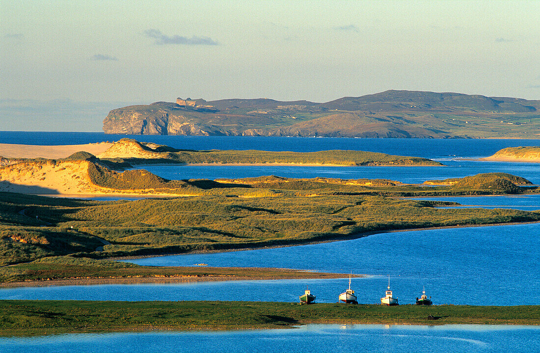 Coastal landscape with fishing boats at Gortahork, County Donegal, Ireland, Europe