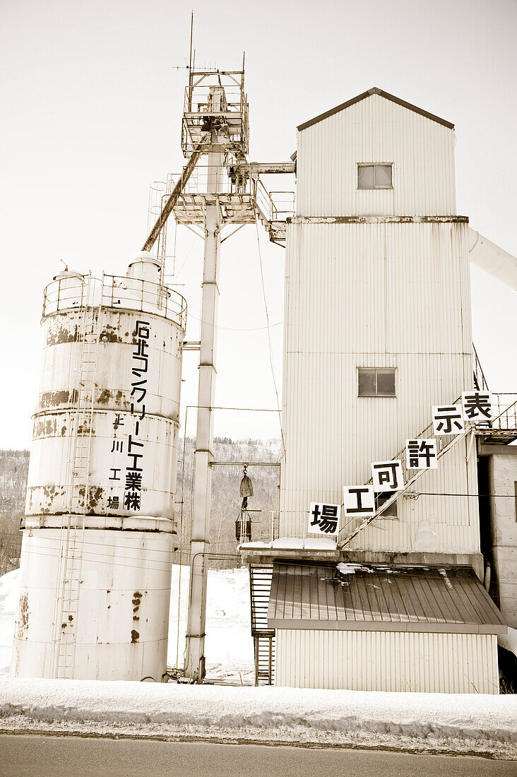 Industrial building with japanese characters in winter, Hokkaido, Japan, Asia