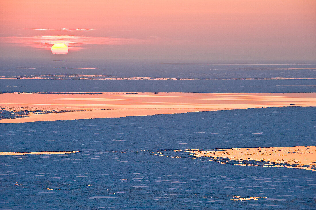 Ice floes on the pacific ocean at sunset, Hokkaido, Japan, Asia