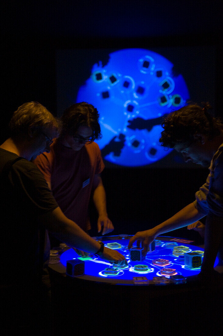 People gathering around a turntable at the Ars Electronica Festival, Linz, Upper Austria, Austria