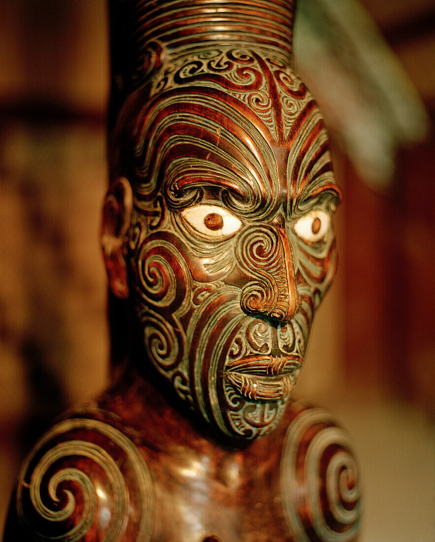 Carved figure on main pole at marae meeting house, Maori and Colonial Museum, Okains Bay, Banks Peninsula, South Island, New Zealand