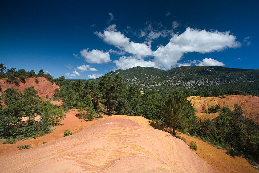 Colorado Provencal, rocks of ochre under a blue sky, Rustrel, Vaucluse, Provence, France