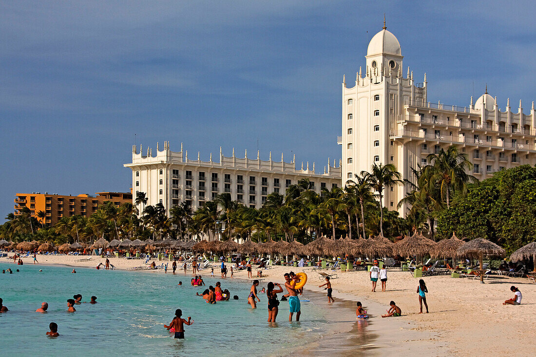 Aruba, Palm Beach, West Indies, Dutch Carribean, Central America, local people at the beach on sunday, Riu Hotel Casino