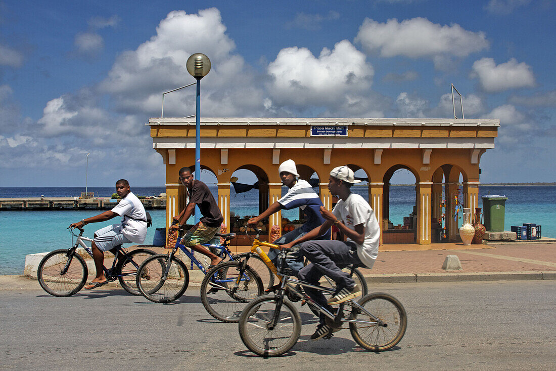 West Indies, Bonaire, Kralendijk, local kids with bicycles, Promenade
