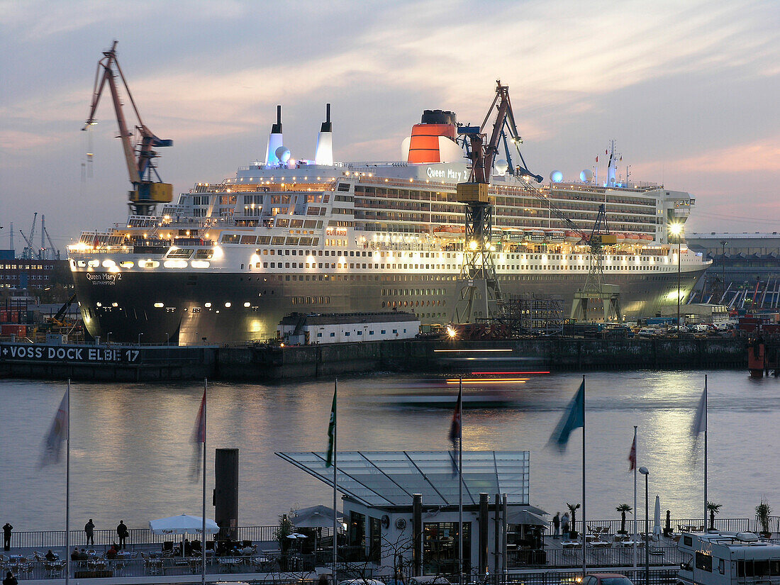 Cruise ship Queen Mary 2 at the shipyard in the evening, Hanseatic City of Hamburg, Germany