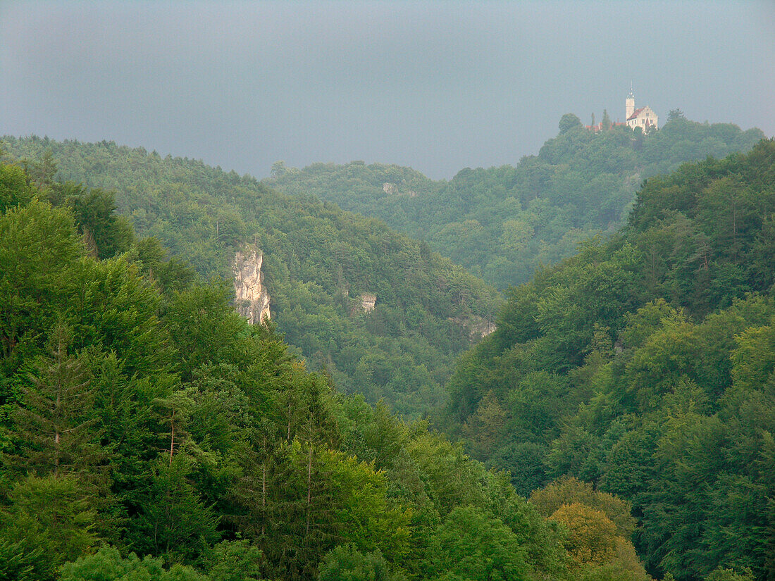 Wiesent Valley with Gössweinstein Castle in the fog, Franconia, Bavaria, Germany