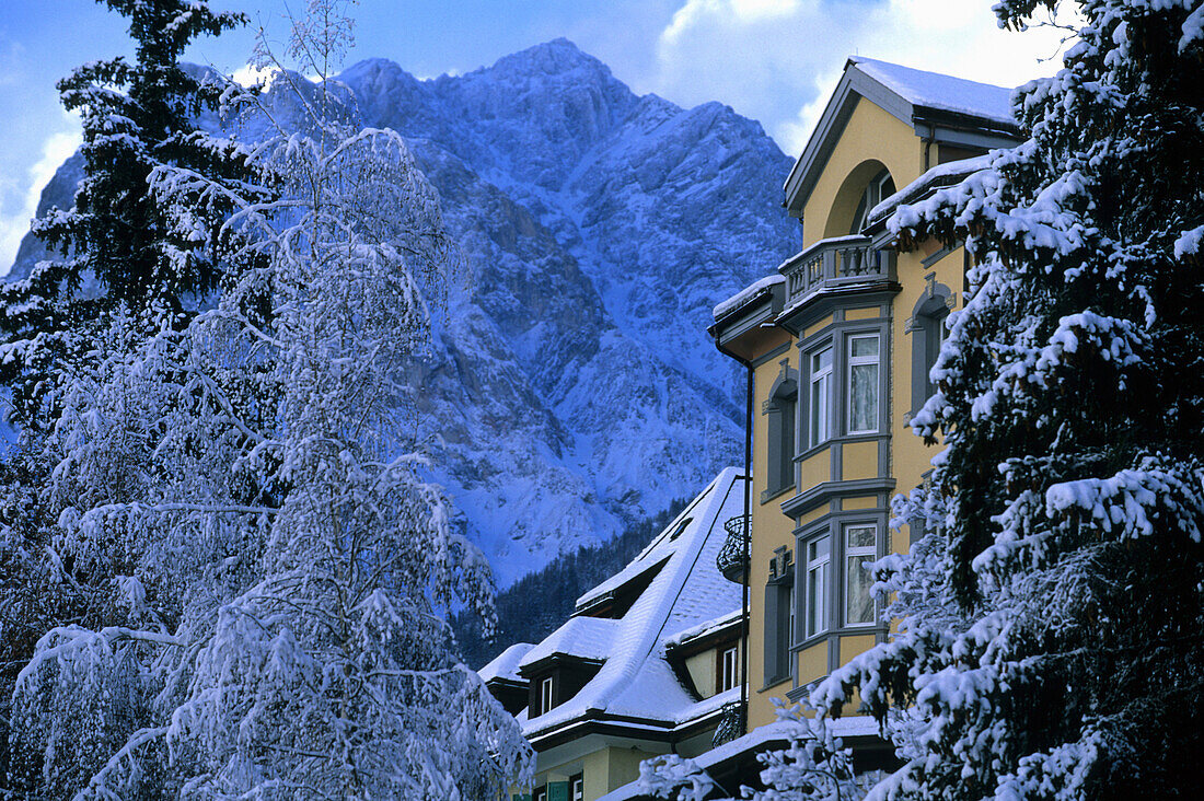 Villa with mountain in background, Vulpera, Tarasp, Lower Engadine, Engadine, Grisons, Switzerland