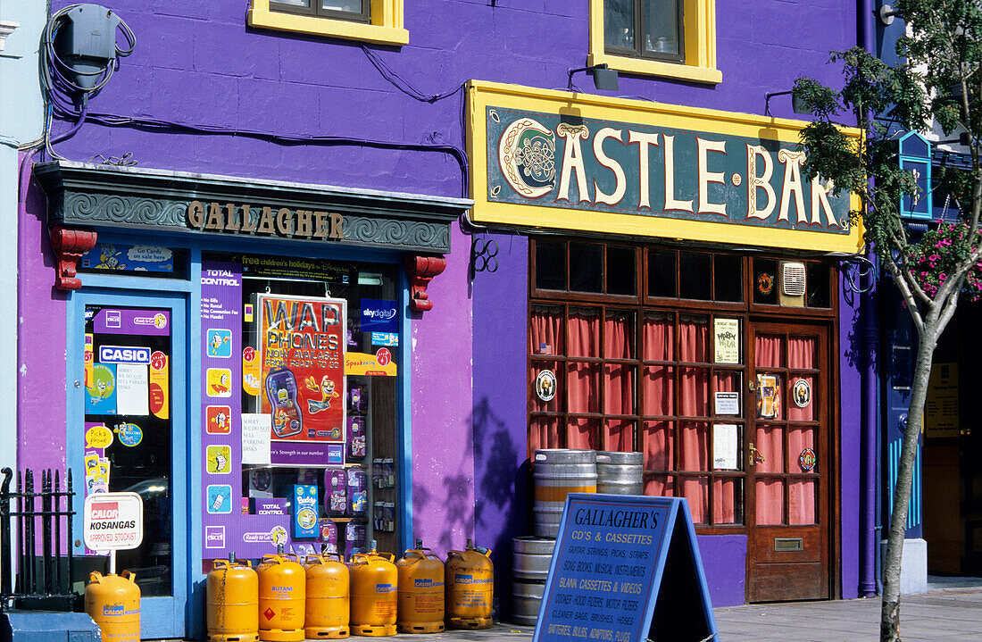 Europe, Great Britain, Ireland, Co.Cork, Macroom, street with shops and pub (Castle Bar)