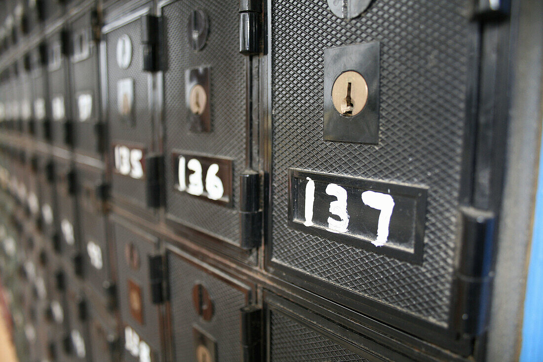 Black PO boxes at post office, Bicheno, Tasmania, Australia