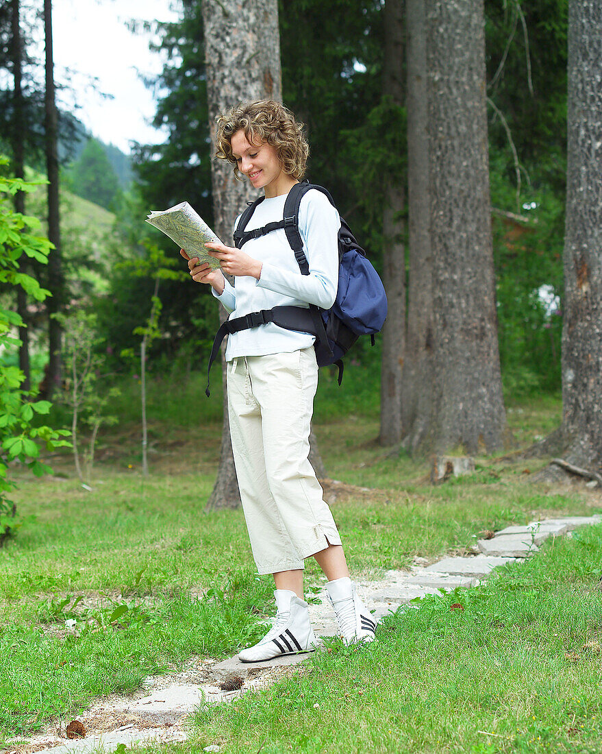 Hiker woman with map