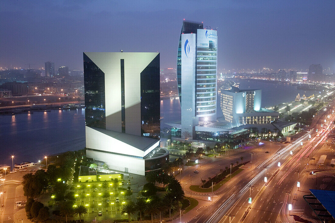 UNITED ARAB EMIRATES (UAE)-DUBAI-Deira: Aerial View of Deira Buildings along Dubai Creek and Baniyas Road/ Evening