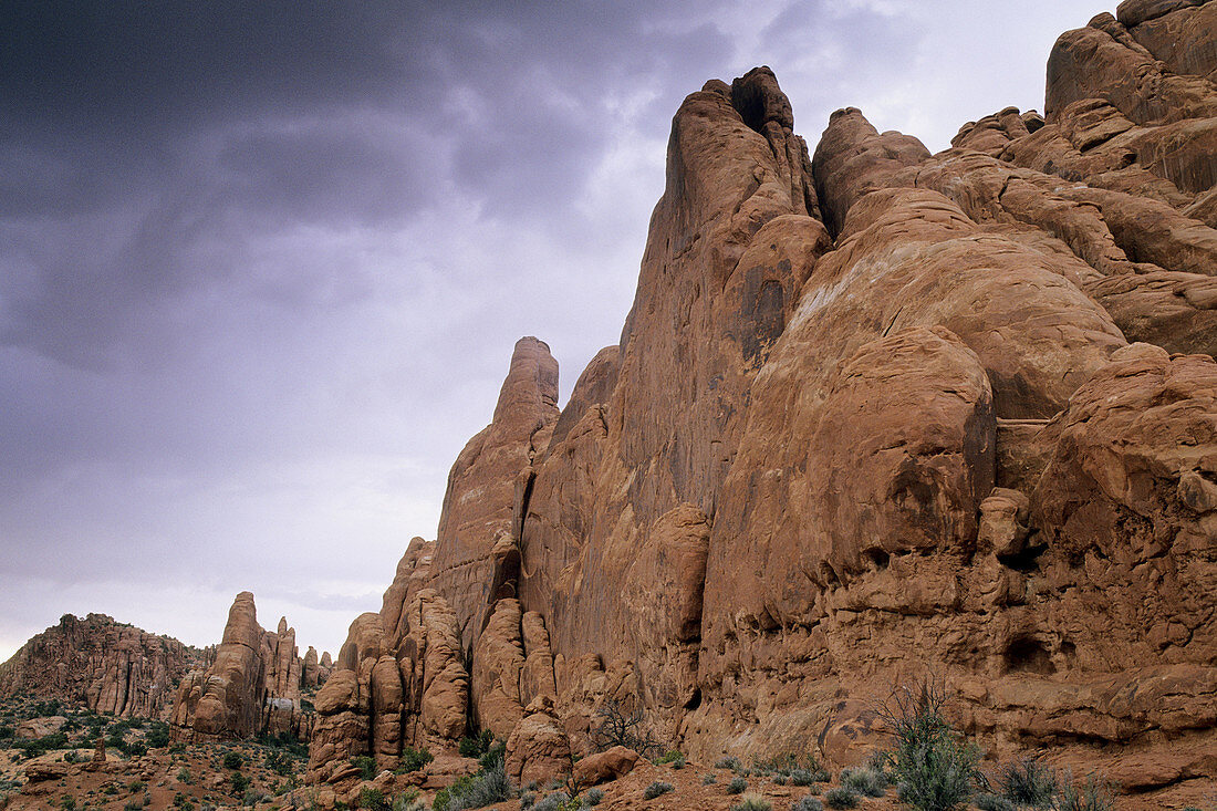 Storm clouds over sandstone formations, near the Fiery Furnace area, Arches National Park, Utah, USA
