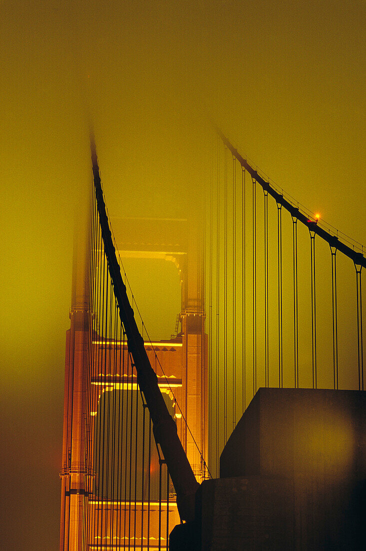 Golden Gate Bridge in fog, San Francisco. California, USA