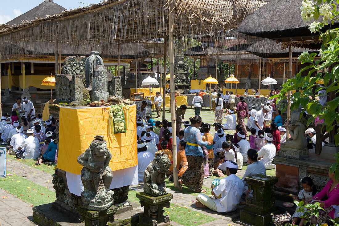 People at temple ceremony at Hindu Temple Pura Puseh, Batuan, Bali, Indonesia